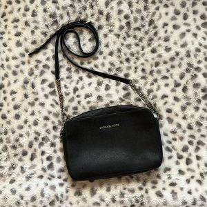 This is a black Michael Kors over the shoulder purse